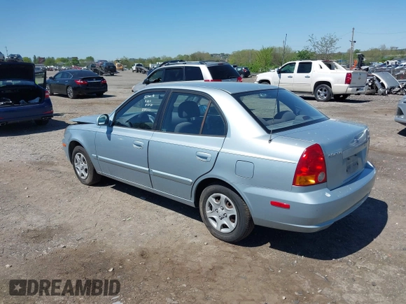 2005 Hyundai Accent GLS with VIN KMHCG45C75U658672, listed as a IAAI auction lot 42107140 with 34,351 mi miles. Bid and sale history available at carsss.com. Image 3.