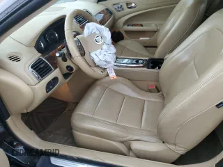 2011 Jaguar XK with VIN SAJWA4EC6BMB39972, listed as a Copart auction lot 70690864 with 98,364 mi miles and Salvage Title. Bid and sale history available at carsss.com. Image 7.