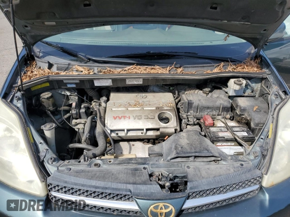 2004 Toyota Sienna XLE with VIN 5TDBA22C24S002697, listed as a Copart auction lot 54633065 with 241,447 mi miles and Clean Title. Bid and sale history available at carsss.com. Image 12.
