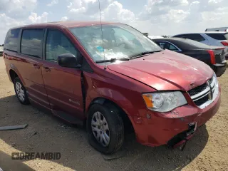 2015 Dodge Grand Caravan SE with VIN 2C4RDGBG2FR613184, listed as a Copart auction lot 67111284 with 249,959 mi miles and Salvage Title. Bid and sale history available at DreamBid. Image 4.