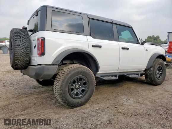 2024 Ford Bronco Wildtrak z VIN 1FMEE2BP4RLA19493, wystawiony jako Copart lot #57669545 z przebiegiem 12 065 mil mil oraz Szkoda całkowita • Salvage title. Historia ofert i sprzedaży dostępna na DreamBid. Obrazek 3.