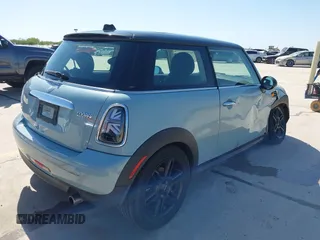 2013 MINI Hardtop with VIN WMWSU3C57DT690398, listed as a IAAI auction lot 41989221 with 112,954 mi miles and . Bid and sale history available at DreamBid. Image 4.
