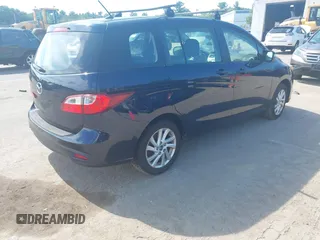 2015 Mazda 5 Sport with VIN JM1CW2BLXF0182264, listed as a IAAI auction lot 42638417 with 142,003 mi miles and . Bid and sale history available at DreamBid. Image 4.