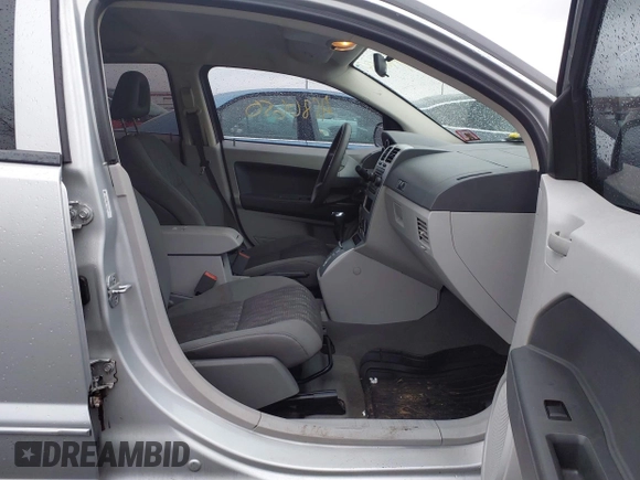 2007 Dodge Caliber SXT with VIN 1B3HB48BX7D379555, listed as a IAAI auction lot 41806050 with 99,662 mi miles and . Bid and sale history available at DreamBid. Image 5.