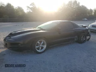 2000 Pontiac Firebird Formula z VIN 2G2FV22G4Y2175318, wystawiony jako Copart lot #68737224 z przebiegiem 229 394 mil mil oraz Szkoda całkowita • Salvage title. Historia ofert i sprzedaży dostępna na DreamBid. Obrazek 1.