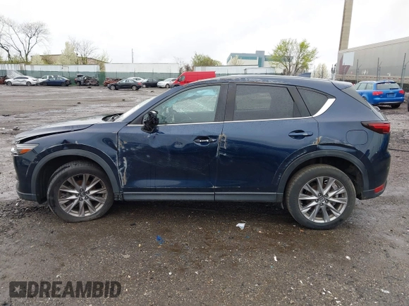2019 Mazda CX-5 Grand Touring with VIN JM3KFBDM6K0592496, listed as a IAAI auction lot 41730103 with Not Provided miles and . Bid and sale history available at carsss.com. Image 13.
