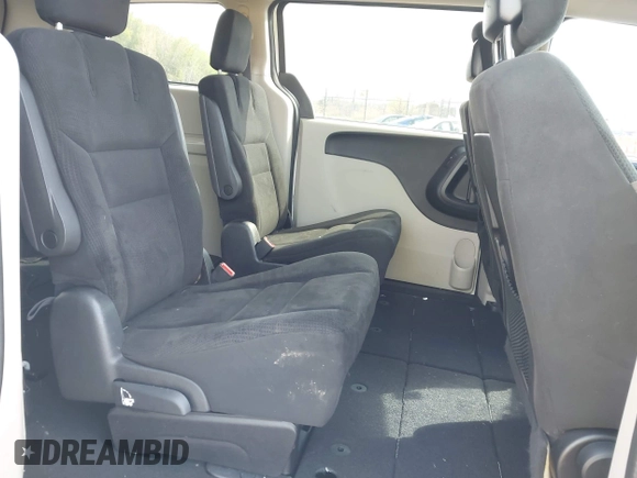 2015 Dodge Grand Caravan SE with VIN 2C4RDGBG9FR660423, listed as a IAAI auction lot 42184835 with 90,356 mi miles and . Bid and sale history available at DreamBid. Image 8.