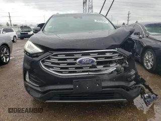 2020 Ford Edge Titanium with VIN 2FMPK4K97LBA16335, listed as a Copart auction lot 59462835 with 89,376 mi miles and Salvage title. Bid and sale history available at DreamBid. Image 5.