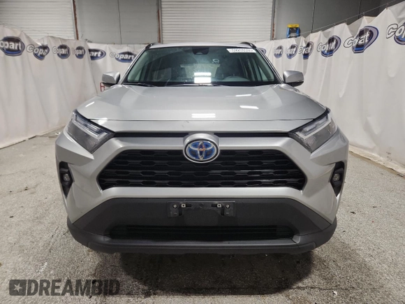 2022 Toyota RAV4 Hybrid XLE Premium with VIN 4T3B6RFV1NU080099, listed as a Copart auction lot 60206905 with 59,859 mi miles and Clean title. Bid and sale history available at DreamBid. Image 5.