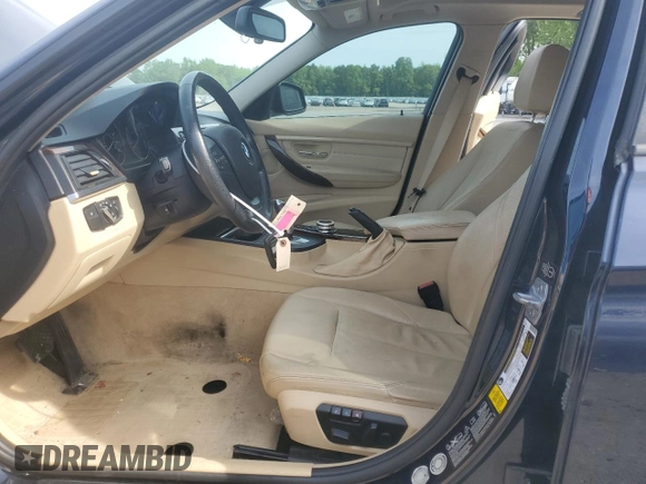 2013 BMW 3 Series 328i xDrive with VIN WBA3B5C52DJ599198, listed as a Copart auction lot 56463365 with 98,808 mi miles and Salvage title. Bid and sale history available at DreamBid. Image 7.