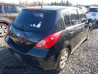 2009 Nissan Versa 1.8 SL with VIN 3N1BC13E59L406937, listed as a IAAI auction lot 41387158 with 149,234 mi miles. Bid and sale history available at carsss.com. Image 4.