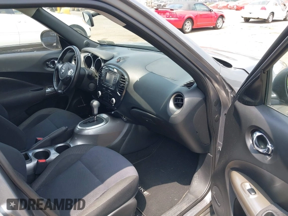 2014 Nissan Juke SL with VIN JN8AF5MV3ET359021, listed as a IAAI auction lot 42602201 with 99,332 mi miles and . Bid and sale history available at DreamBid. Image 5.