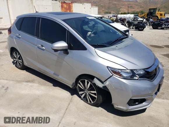 2018 Honda Fit EX with VIN 3HGGK5H88JM719092, listed as a Copart auction lot 61271925 with 86,516 mi miles and Salvage title. Bid and sale history available at DreamBid. Image 4.