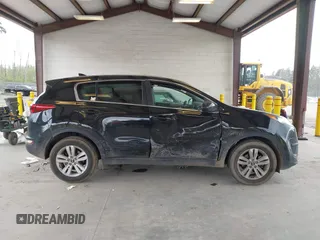 2018 Kia Sportage LX with VIN KNDPM3AC7J7463078, listed as a IAAI auction lot 42086356 with 75,406 mi miles and . Bid and sale history available at carsss.com. Image 13.