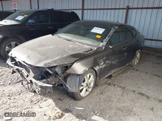 2011 Kia Optima EX with VIN KNAGN4A73B5168155, listed as a IAAI auction lot 41101951 with 149,142 mi miles. Bid and sale history available at carsss.com. Image 17.