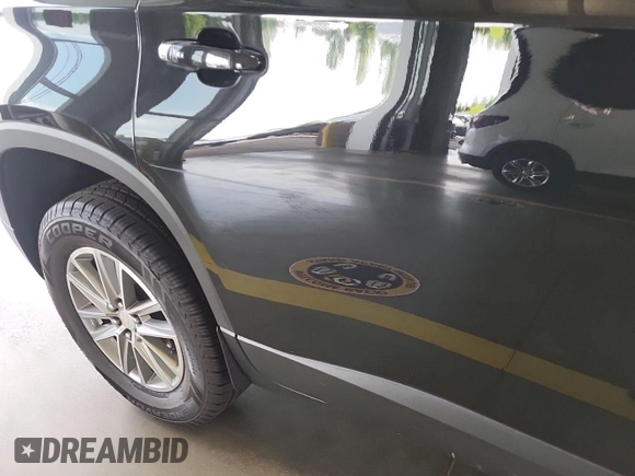 2022 Chevrolet Traverse LT with VIN 1GNERHKW6NJ133009, listed as a IAAI auction lot 42634836 with 90,143 mi miles and . Bid and sale history available at DreamBid. Image 16.