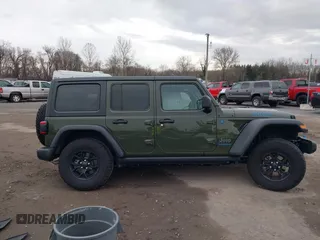 2024 Jeep Wrangler Willys z VIN 1C4RJXN64RW163089, wystawiony jako IAAI lot #41145274 z przebiegiem 31 869 mil mil oraz . Historia ofert i sprzedaży dostępna na DreamBid. Obrazek 13.
