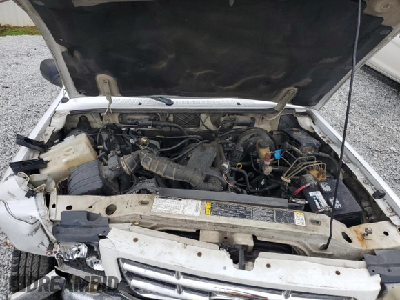 2002 Ford Ranger XL Fleet with VIN 1FTYR44U82TA21001, listed as a Copart auction lot 58392305 with 234,824 mi miles and Salvage title. Bid and sale history available at DreamBid. Image 11.