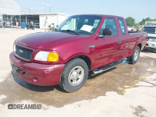 2004 Ford F-150 XL with VIN 2FTRX17224CA73868, listed as a IAAI auction lot 41923279 with 149,910 mi miles and . Bid and sale history available at DreamBid. Image 2.