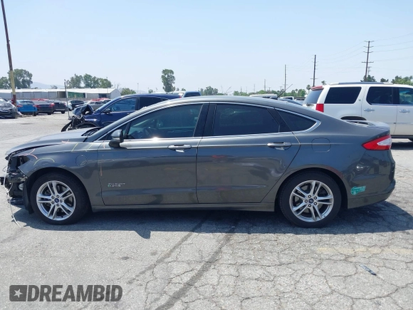 2016 Ford Fusion Titanium with VIN 3FA6P0SU1GR304590, listed as a IAAI auction lot 42381545 with 136,684 mi miles and . Bid and sale history available at DreamBid. Image 15.
