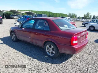 2003 Mazda Protege DX with VIN JM1BJ225930195479, listed as a IAAI auction lot 42199689 with 148,382 mi miles and . Bid and sale history available at DreamBid. Image 3.