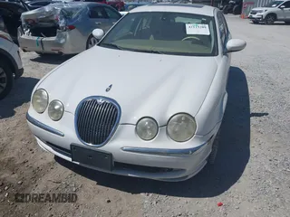 2003 Jaguar S-Type with VIN SAJEA01U93HM89560, listed as a IAAI auction lot 42115289 with 236,905 mi miles and . Bid and sale history available at DreamBid. Image 6.
