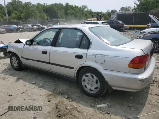 1997 Honda Civic LX z VIN 2HGEJ6677VH573069, wystawiony jako Copart lot #59739065 z przebiegiem 287 987 mil mil oraz Szkoda całkowita • Salvage title. Historia ofert i sprzedaży dostępna na DreamBid. Obrazek 2.