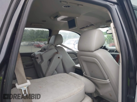 2012 Chevrolet Tahoe LT with VIN 1GNSCBE05CR211898, listed as a IAAI auction lot 42612993 with 233,367 mi miles and . Bid and sale history available at DreamBid. Image 8.