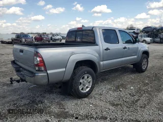 2014 Toyota Tacoma PreRunner with VIN 5TFJU4GN9EX057703, listed as a Copart auction lot 52425505 with 194,884 mi miles and Clean Title. Bid and sale history available at carsss.com. Image 3.