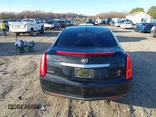 2013 Cadillac XTS z VIN 2G61N5S32D9238652, wystawiony jako IAAI lot #40966692 z przebiegiem 90 834 mil mil oraz . Historia ofert i sprzedaży dostępna na DreamBid. Obrazek 16.