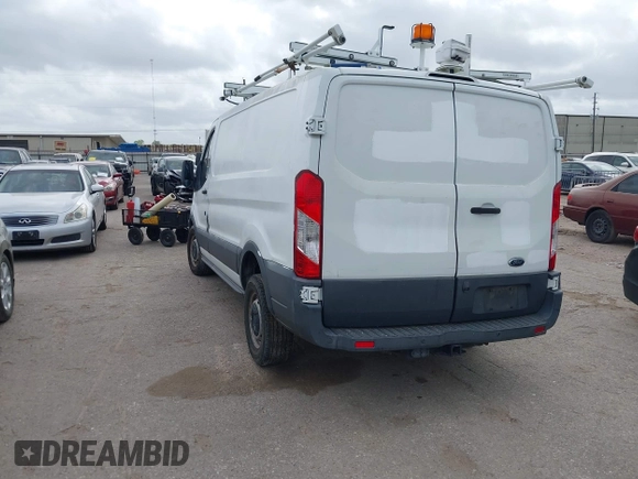 2016 Ford Transit Cargo z VIN 1FTYR1ZM5GKA09697, wystawiony jako IAAI lot #41929098 z przebiegiem 98 790 mil mil oraz . Historia ofert i sprzedaży dostępna na DreamBid. Obrazek 3.