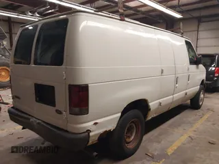 2007 Ford Econoline Cargo Commercial with VIN 1FTNE14W47DA86573, listed as a IAAI auction lot 41294485 with 197,325 mi miles and . Bid and sale history available at DreamBid. Image 4.
