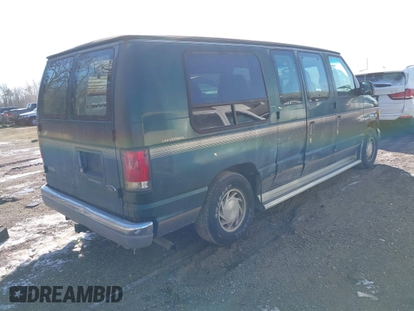 1999 Ford Econoline Cargo with VIN 1FDRE14W3XHB36482, listed as a IAAI auction lot 41393346 with 130,669 mi miles. Bid and sale history available at carsss.com. Image 4.