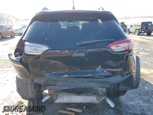 2018 Jeep Cherokee Trailhawk with VIN 1C4PJMBX2JD571903, listed as a Copart auction lot 88515745 with 79,598 mi miles and Salvage Title. Bid and sale history available at DreamBid. Image 6.