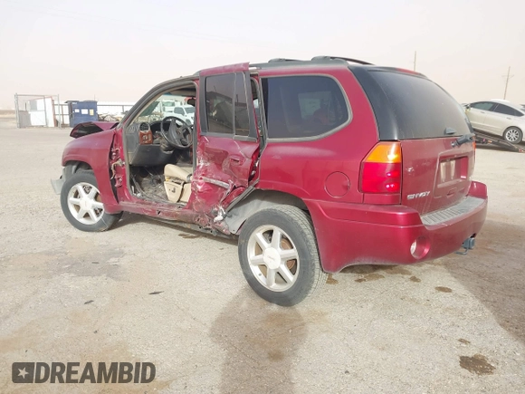 2007 GMC Envoy SLE with VIN 1GKDT13S972277907, listed as a IAAI auction lot 41367293 with 194,760 mi miles. Bid and sale history available at carsss.com. Image 3.