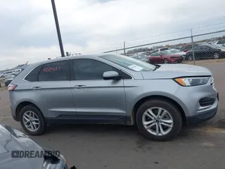 2022 Ford Edge SEL z VIN 2FMPK4J93NBA94793, wystawiony jako IAAI lot #41884687 z przebiegiem 57 372 mil mil oraz . Historia ofert i sprzedaży dostępna na DreamBid. Obrazek 13.