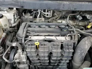 2017 Dodge Journey SE z VIN 3C4PDCAB2HT525564, wystawiony jako Copart lot #85176985 z przebiegiem 137 490 mil mil oraz Szkoda całkowita • Salvage title. Historia ofert i sprzedaży dostępna na DreamBid. Obrazek 14.