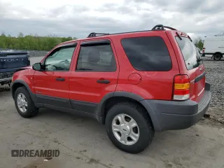 2002 Ford Escape XLT Choice with VIN 1FMCU04132KB16848, listed as a Copart auction lot 55266595 with 205,451 mi miles and Salvage title. Bid and sale history available at DreamBid. Image 2.