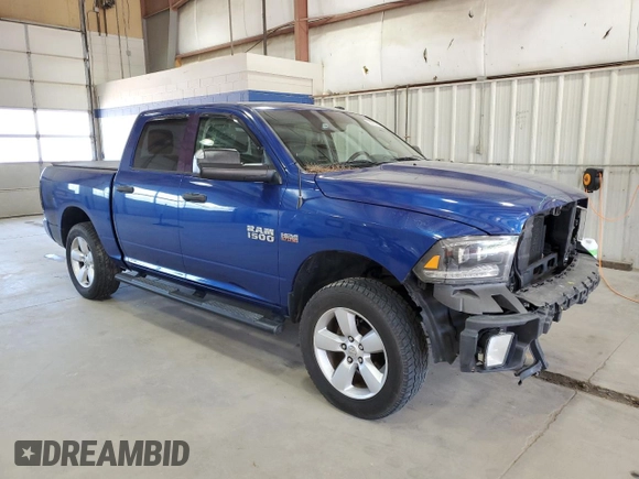 2014 Ram 1500 Express with VIN 3C6RR7KT4EG324804, listed as a Copart auction lot 58233005 with 103,306 mi miles and Salvage title. Bid and sale history available at DreamBid. Image 4.