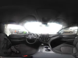 2024 Toyota Camry LE z VIN 4T1C11AK2RU879602, wystawiony jako IAAI lot #42162353 z przebiegiem 6 185 mil mil oraz . Historia ofert i sprzedaży dostępna na DreamBid. Obrazek 18.