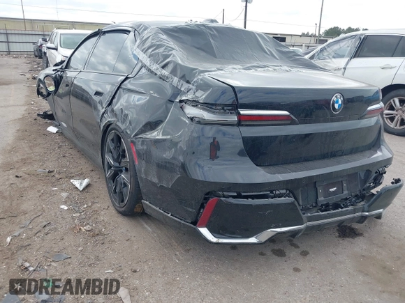 2023 BMW 7 Series 740i with VIN WBA23EH05PCM58771, listed as a IAAI auction lot 42024556 with Not provided miles and . Bid and sale history available at DreamBid. Image 3.