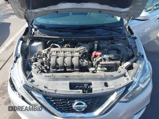 2017 Nissan Sentra S z VIN 3N1AB7AP9HY277592, wystawiony jako IAAI lot #42287903 z przebiegiem 186 876 mil mil oraz . Historia ofert i sprzedaży dostępna na DreamBid. Obrazek 10.