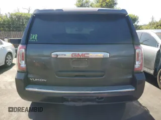 2015 GMC Yukon Denali with VIN 1GKS2CKJ8FR596848, listed as a Copart auction lot 52048105 with 129,935 mi miles and Salvage Title. Bid and sale history available at carsss.com. Image 6.
