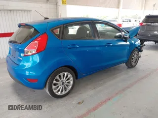 2014 Ford Fiesta SE with VIN 3FADP4EJ7EM204438, listed as a IAAI auction lot 42098291 with 184,930 mi miles and . Bid and sale history available at DreamBid. Image 4.