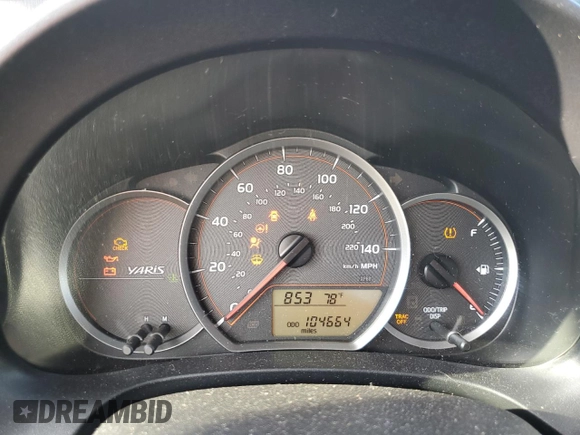 2014 Toyota Yaris L with VIN VNKJTUD30EA006137, listed as a Copart auction lot 72061304 with 104,664 mi miles and Salvage Title. Bid and sale history available at carsss.com. Image 9.