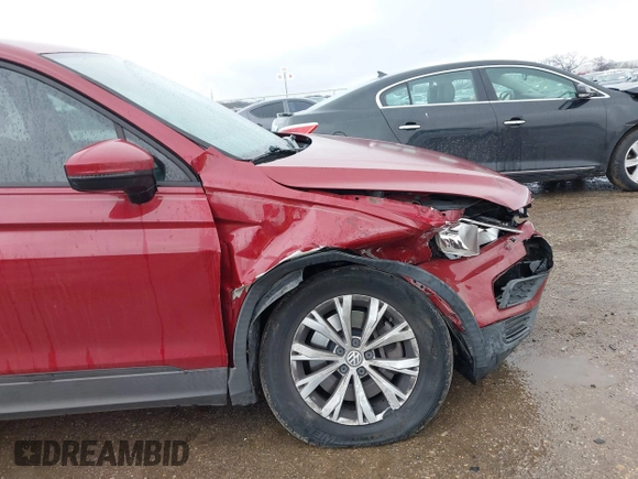 2018 Volkswagen Tiguan S with VIN 3VV1B7AX8JM124827, listed as a IAAI auction lot 41544321 with 101,492 mi miles and . Bid and sale history available at DreamBid. Image 6.