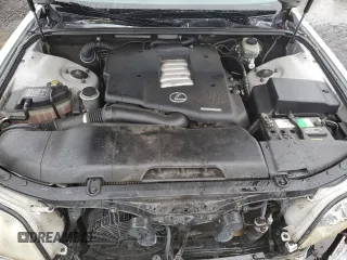 2000 Lexus LS 400 z VIN JT8BH28F8Y0168520, wystawiony jako Copart lot #87434874 z przebiegiem 149 846 mil mil oraz Szkoda całkowita • Salvage title. Historia ofert i sprzedaży dostępna na DreamBid. Obrazek 11.