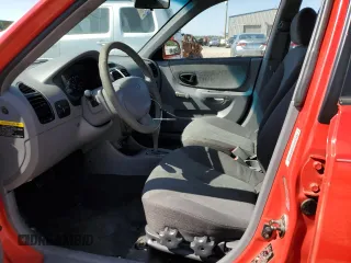2005 Hyundai Accent GLS with VIN KMHCG45C15U592443, listed as a Copart auction lot 52291025 with 142,263 mi miles and Salvage Title. Bid and sale history available at carsss.com. Image 7.