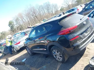 2021 Hyundai Tucson SE with VIN KM8J23A40MU334847, listed as a IAAI auction lot 41817556 with 63,000 mi miles and . Bid and sale history available at DreamBid. Image 14.