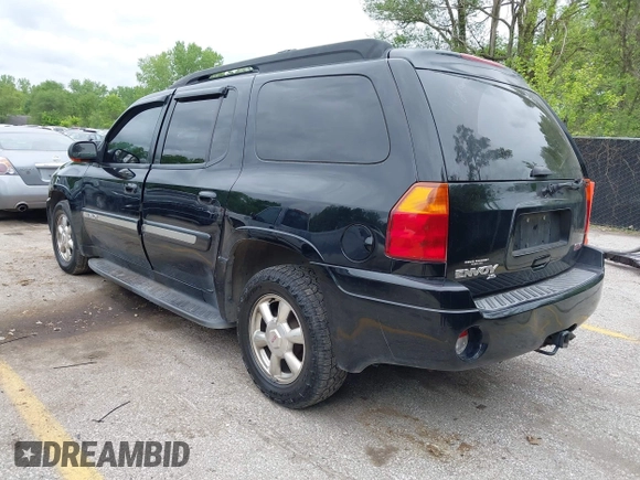 2005 GMC Envoy XL SLE with VIN 1GKET16S156114805, listed as a IAAI auction lot 42163519 with 168,584 mi miles. Bid and sale history available at carsss.com. Image 3.